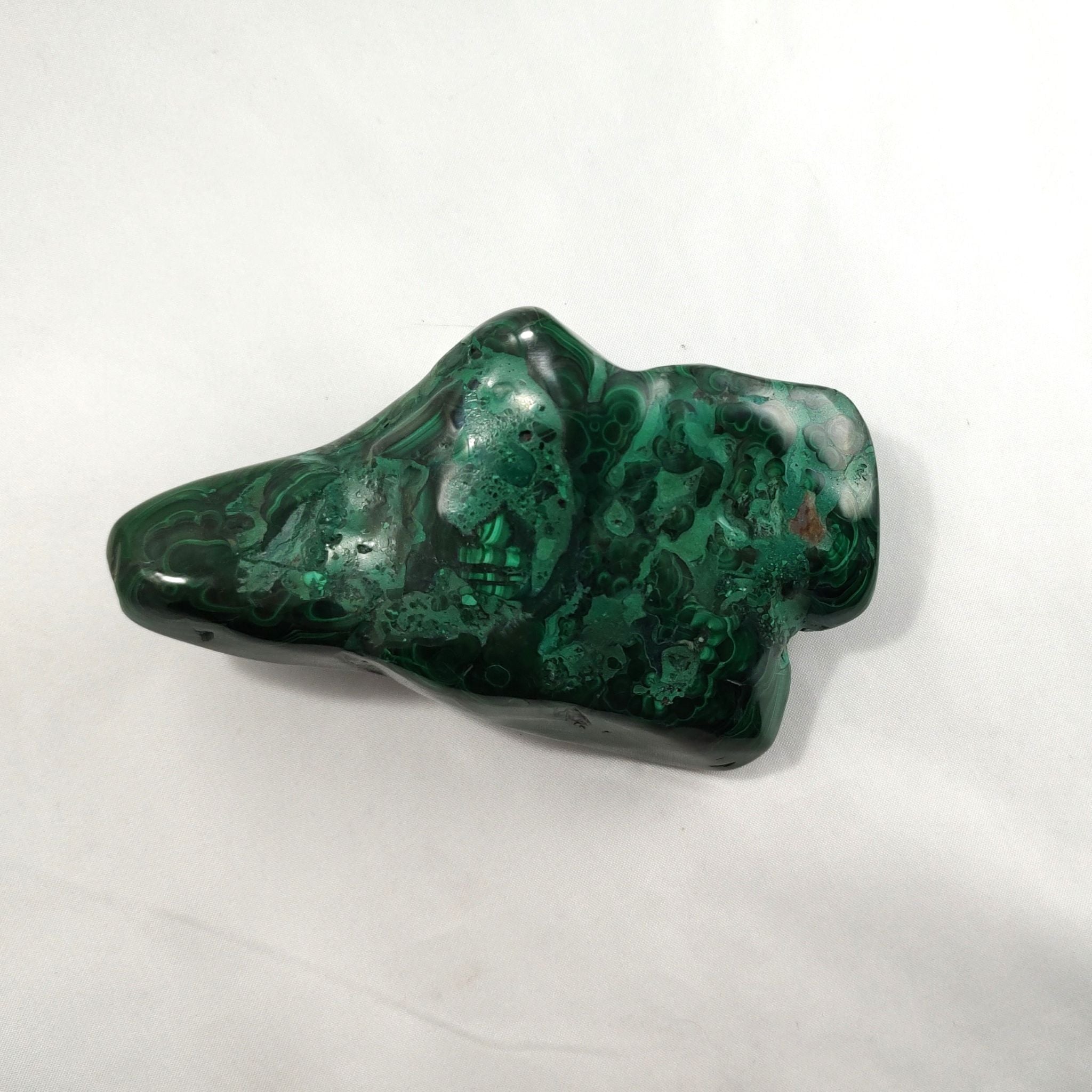 Back of malachite crystal freeform carving