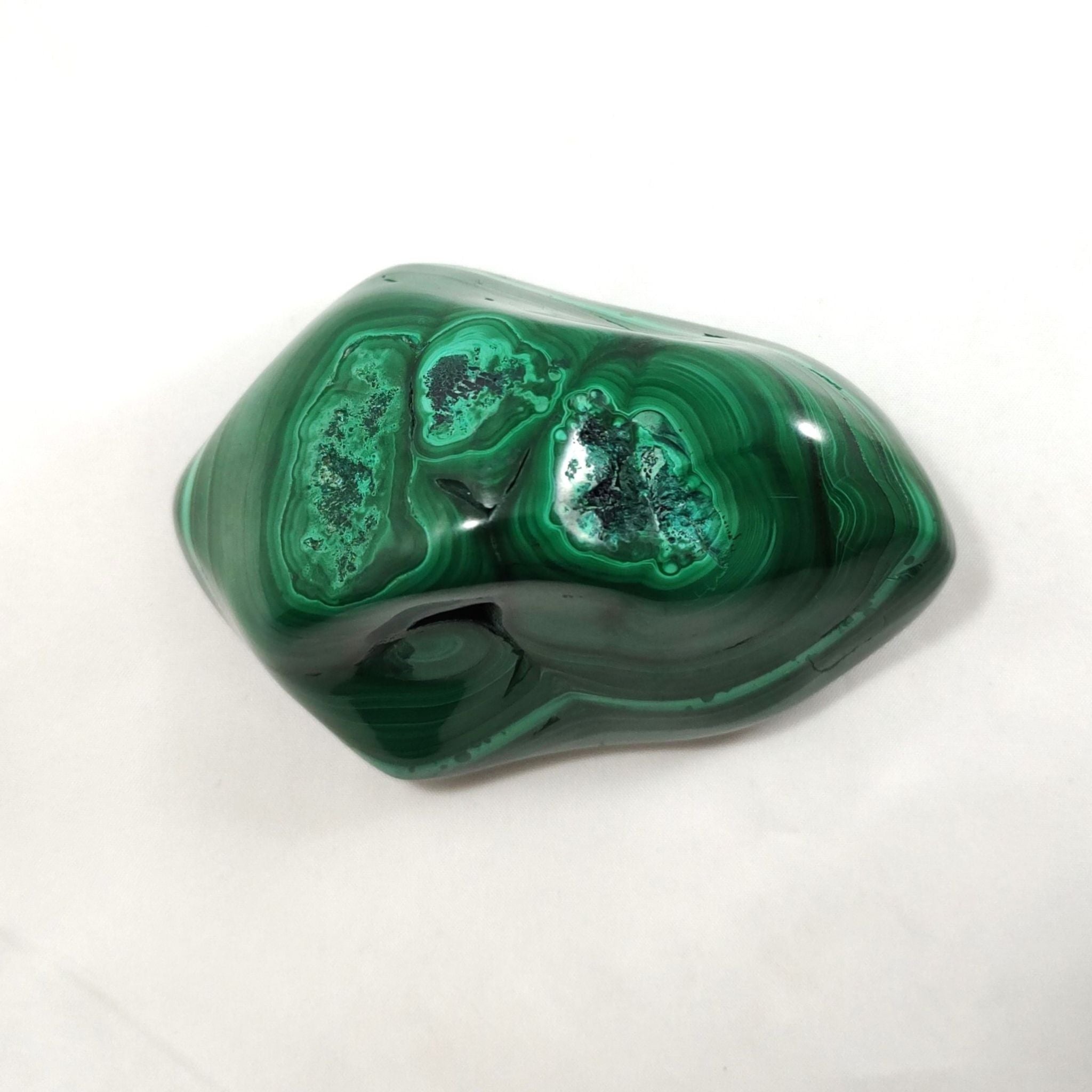 Back of malachite crystal freeform carving