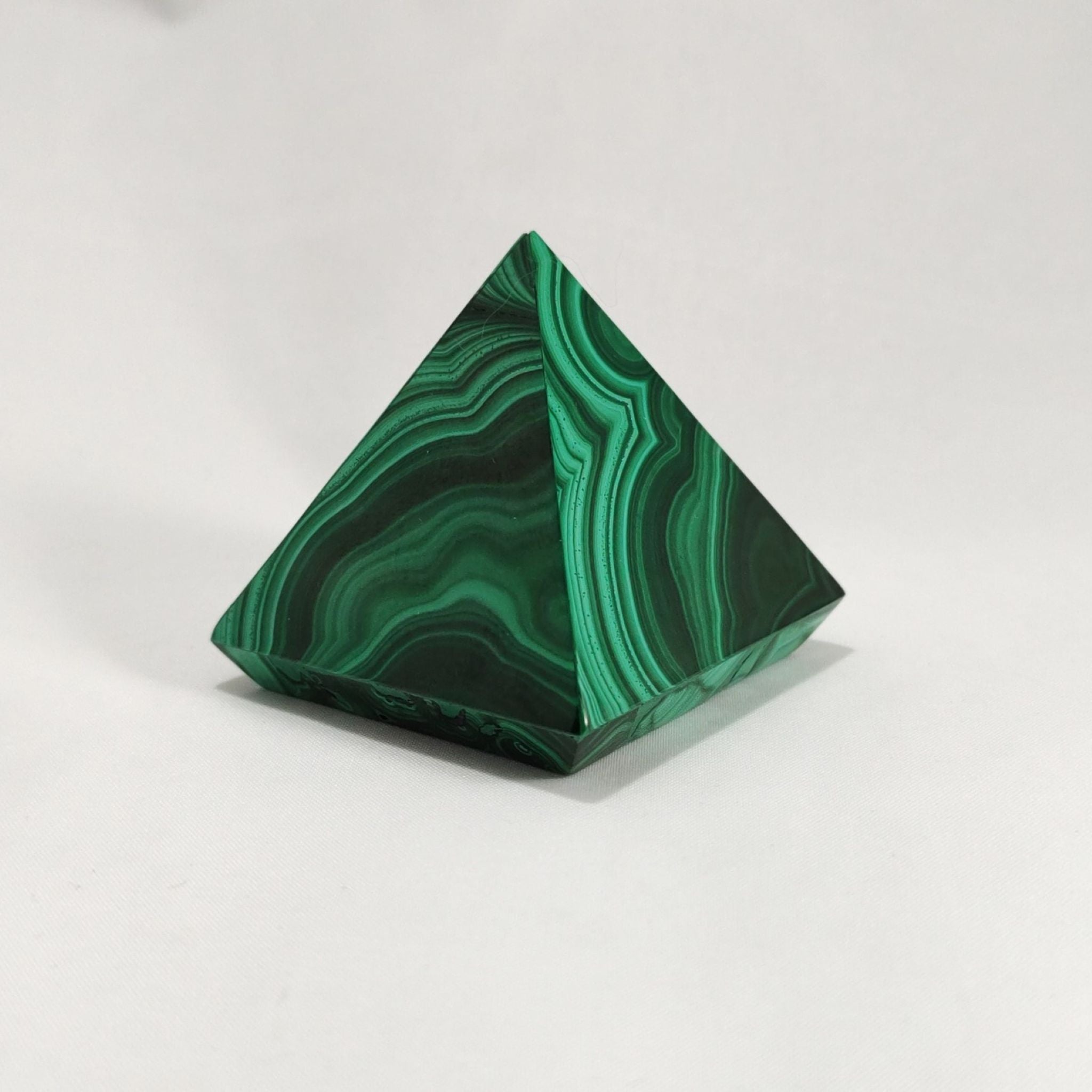 Handcrafted pyramid, made with malachite.