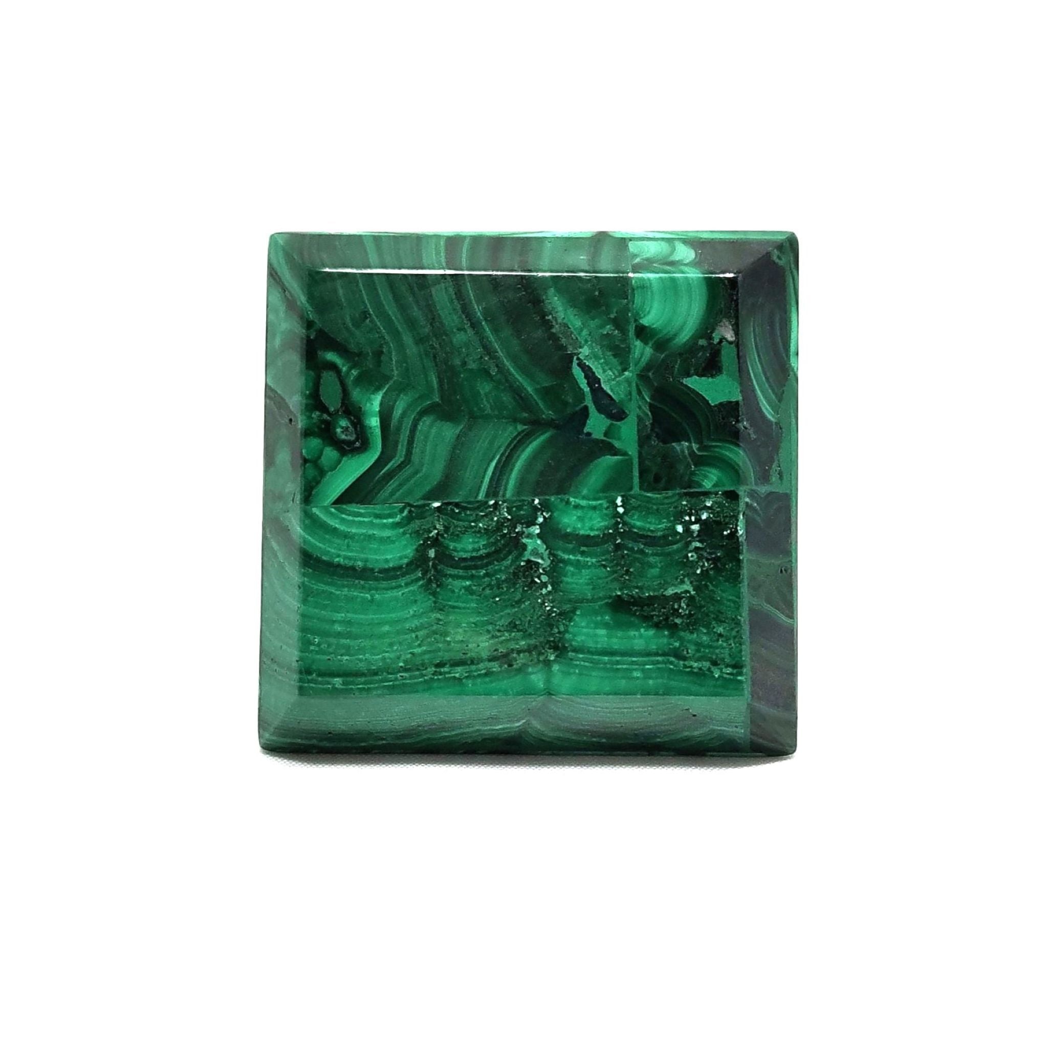 Bottom view of handcrafted pyramid, made with malachite.