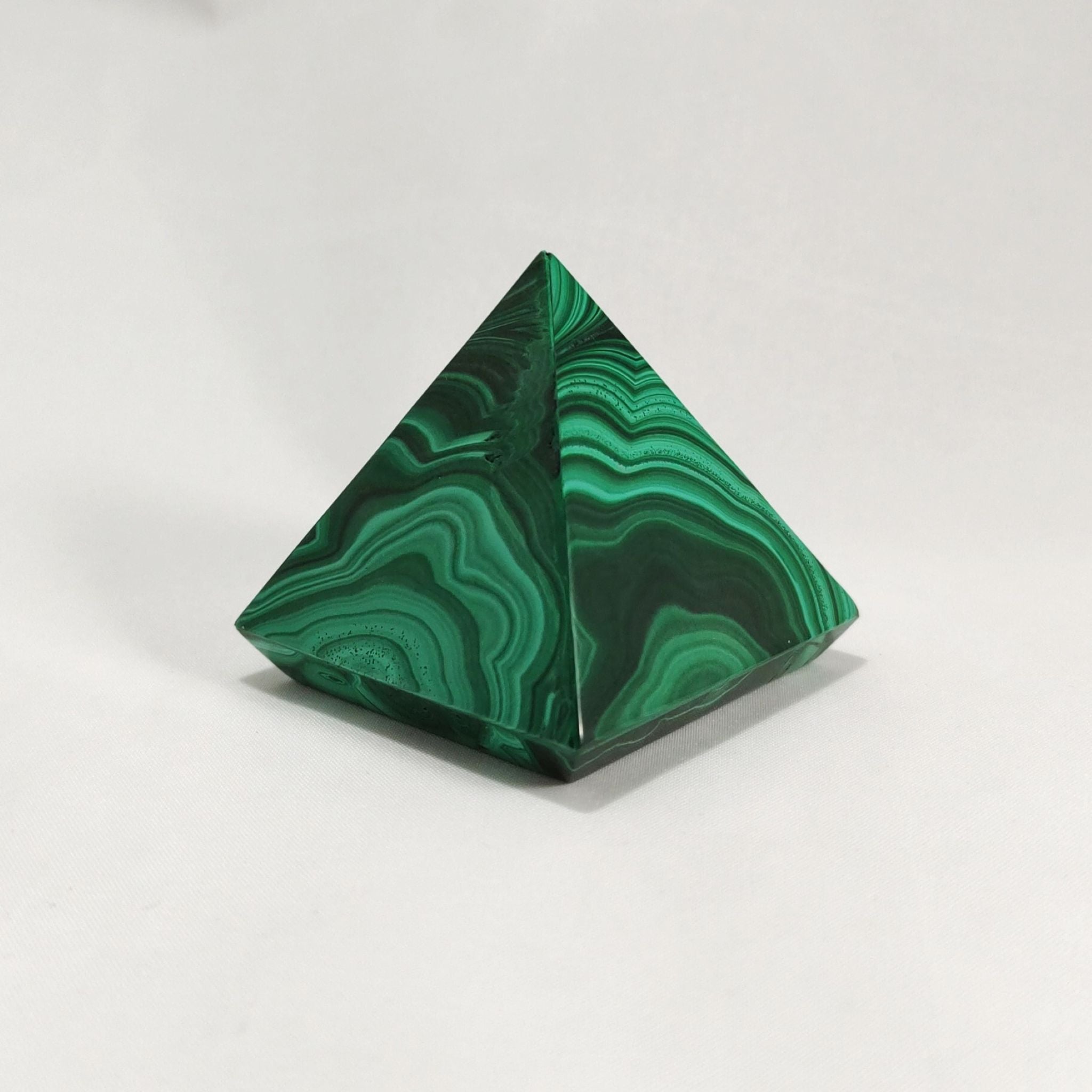 Handcrafted pyramid, made with malachite.