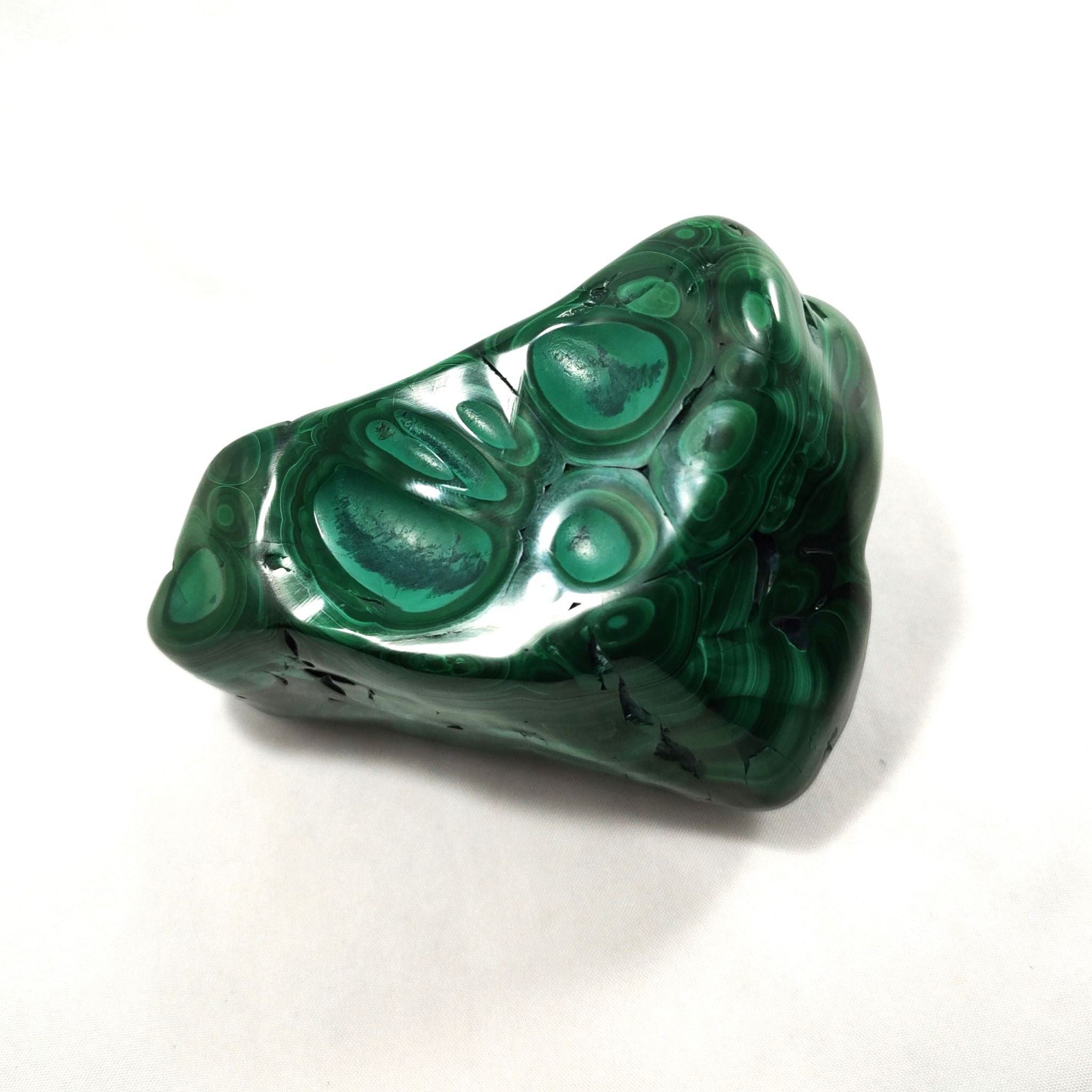 Back of malachite freeform carving