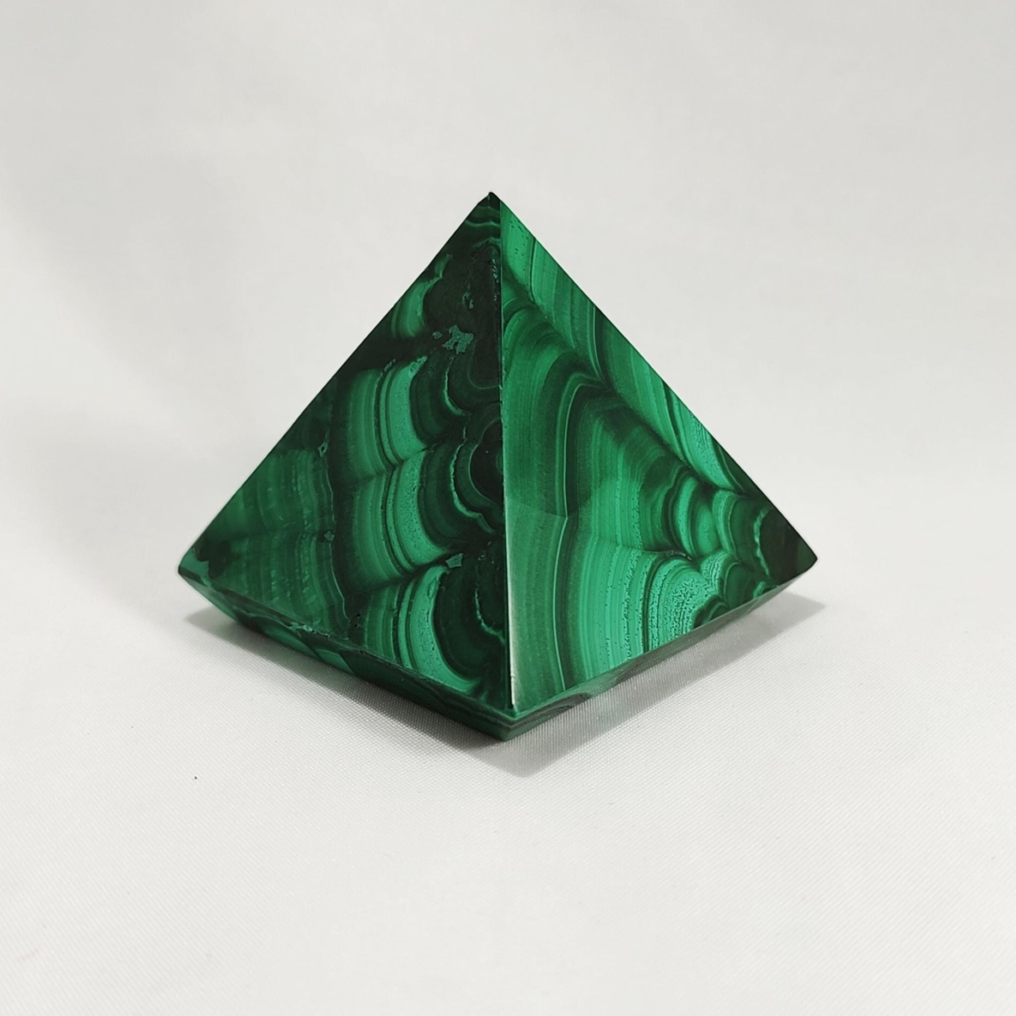 Handcrafted pyramid, made with malachite.